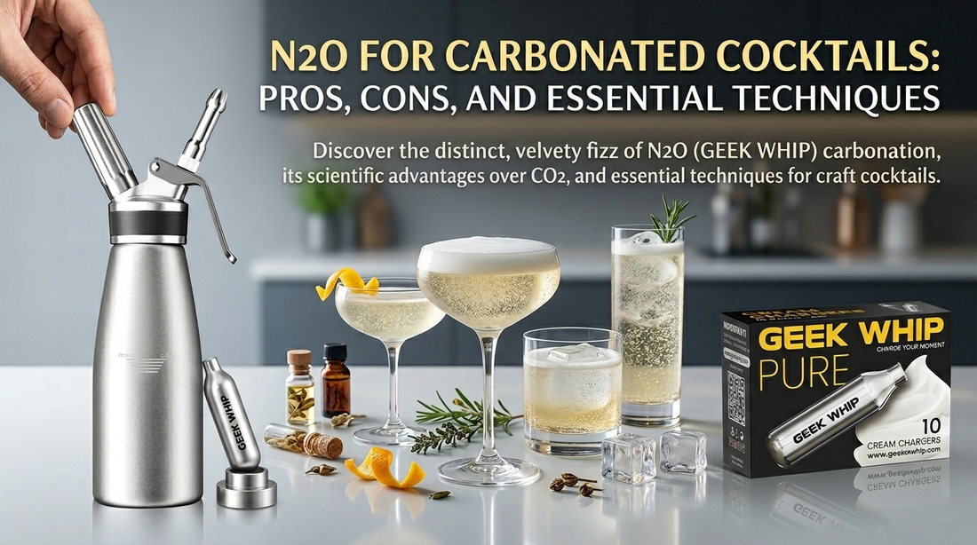 A crystal-clear cocktail glass showing fine, velvety bubbles created through N2O carbonation technique in a professional stainless steel siphon.